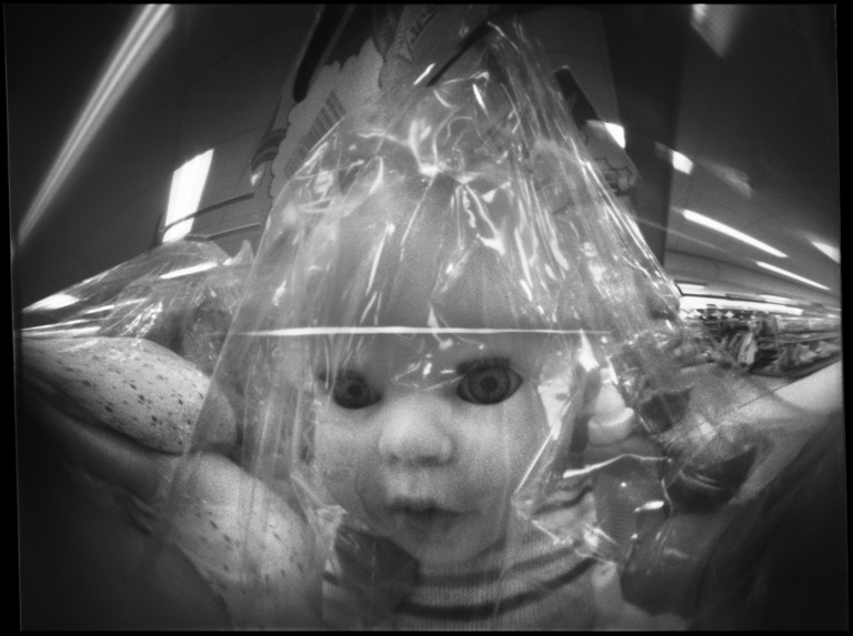 François Vogel - doll at the store